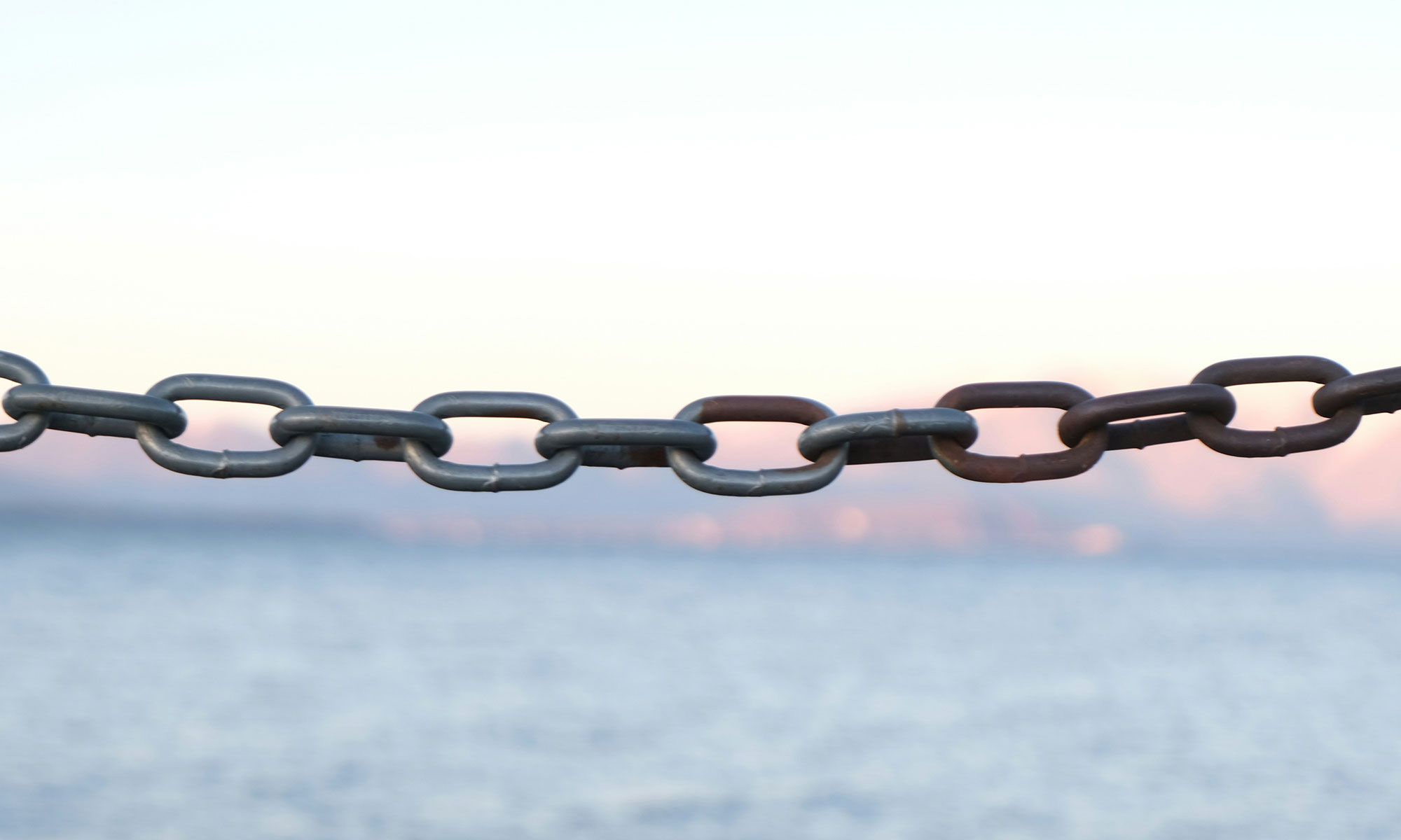 Chain symbolizing boundaries and strong connections in designer-client relationships